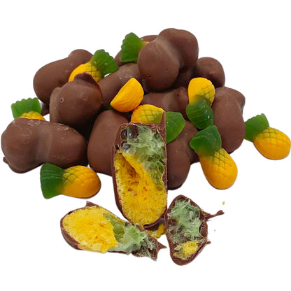 Pineapple chocolate coated freeze dried candy lollies